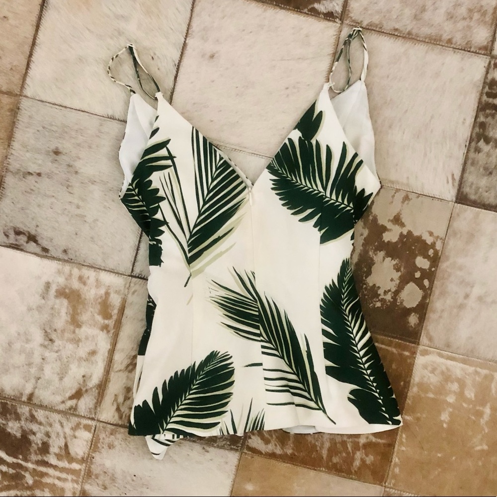 Tropical C/MEO Collective vacation top